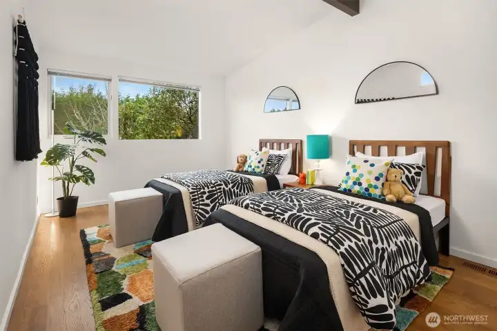 The 3rd main-floor bedroom is even larger than the last.  Think bunk-beds + dressers + play +......