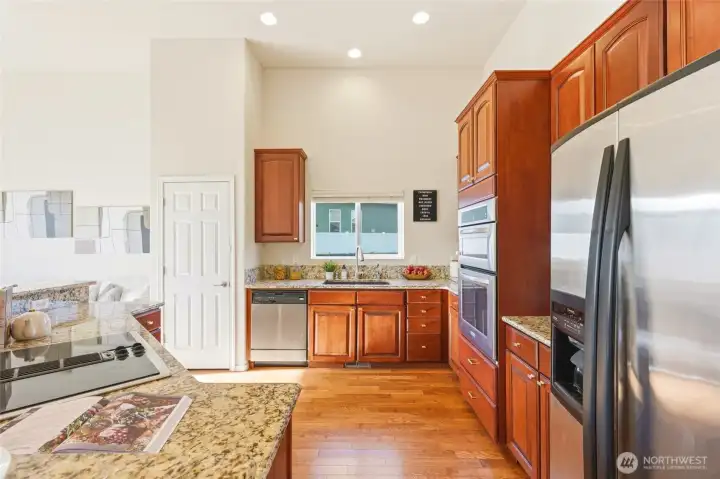 Features granite counters and stainless steel appliances for a modern, polished look.