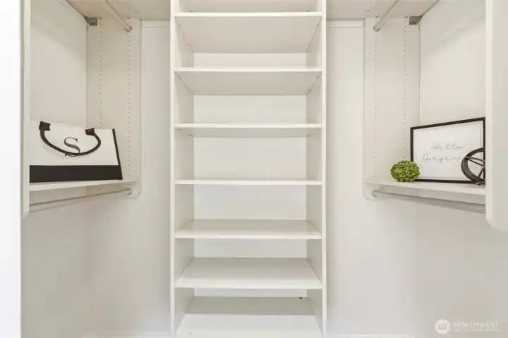 Walk-in closet offers plenty of storage and organization.