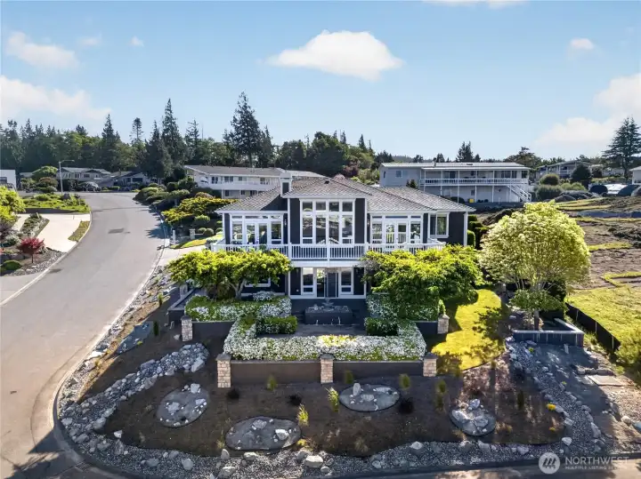 Skyline view home with architecture that commands it's site. Bold white trim and a comfortable, livable floor plan.