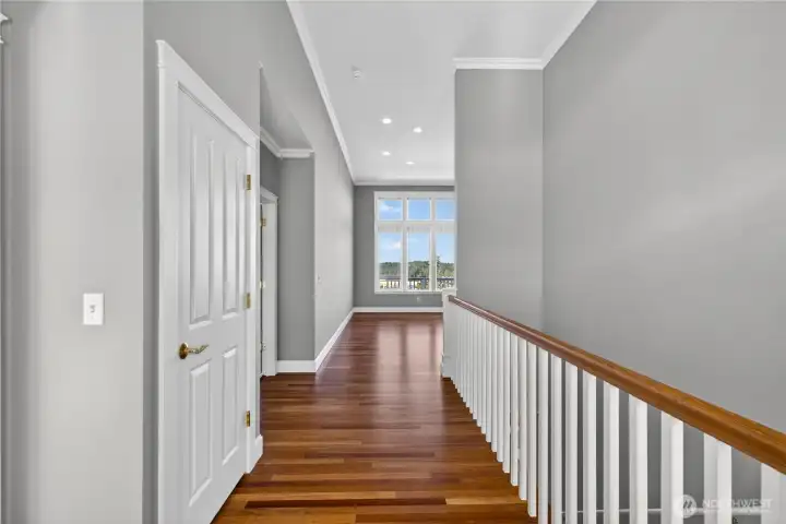 Enter to gorgeous wood floors and contrasting woodwork. The view draws you in.