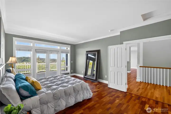 Large double-doors open the primary bedroom into the living space if you wish, or close it off for privacy.