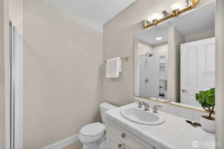 3/4 bath for lower level bedroom #1. New Kohler shower installed recently.