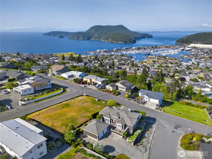 Oh, what a view and location. Construction of another luxury home has begun on the vacant lot next door.