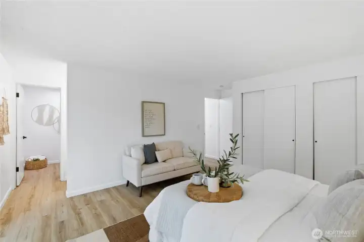 Additional view highlights dual closets and a private en suite entry, offering excellent storage and functionality.