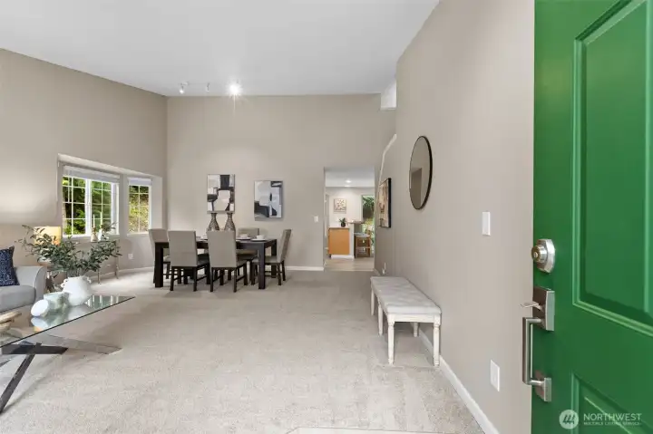 Formal living and dining welcomes in.