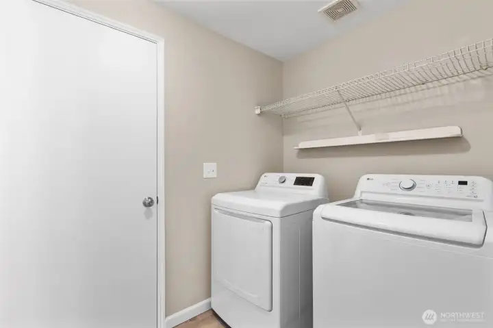 Spacious designated laundry room on the main floor