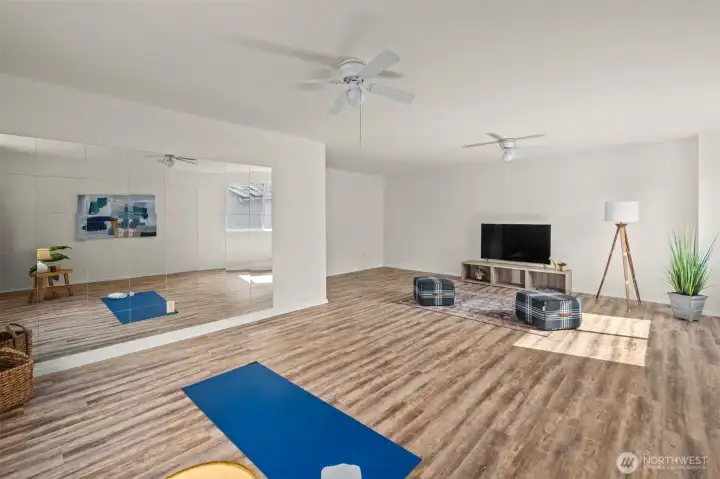 The ceiling fans help circulate the cool air during high impact workouts! And has easy to clean LVP flooring.