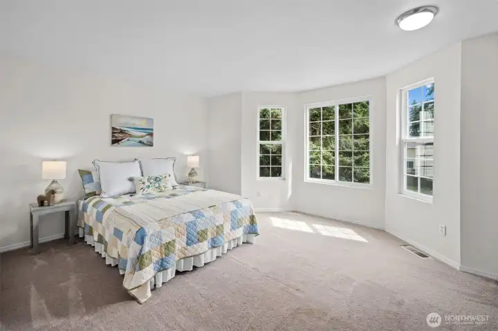 Generously sized bedroom! This home is close to parks, trails, and the golf course.