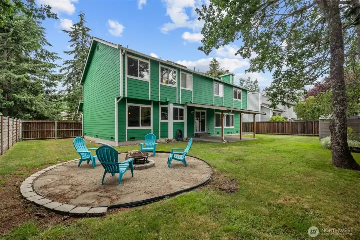 Fully fenced yard for pets and play! The RV parking is on the left with gates that fully open. Clean out available too!
