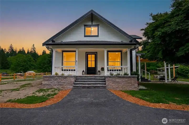 Front facade with new custom entry way, including undermount lighting on stairs.