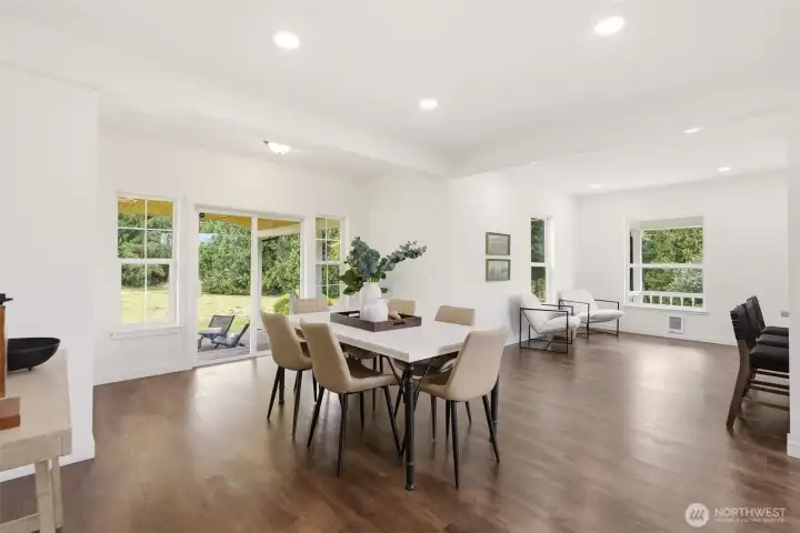 Dining area is perfectly situated between kitchen and back patio. Excellent for entertaining.