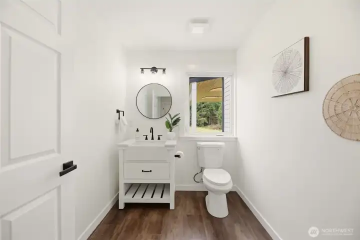 Newly renovated 1/2 bath on main level.