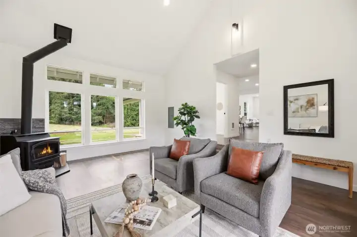 This space has a brand new wood burning stove, vaulted ceiling, and and entry to the underground Cellar.