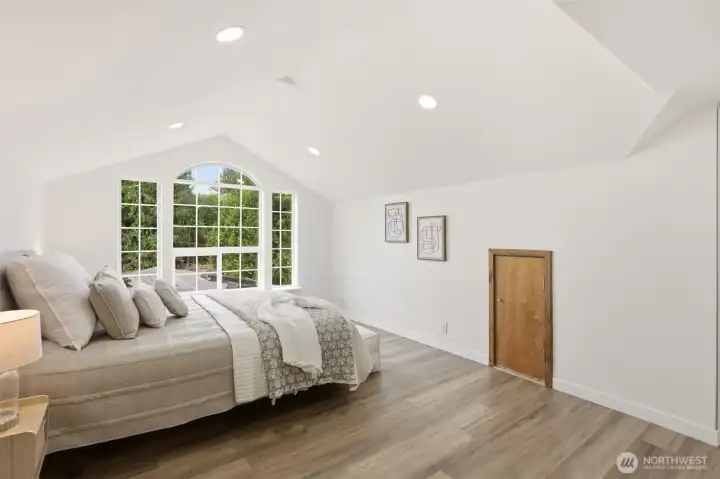 Up the first set of stairs, is the first primary w/ ensuite. This space has an additional bonus room- great for home office/nursery.