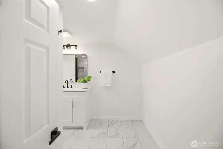 Newly renovated 3/4 bath off primary #1.