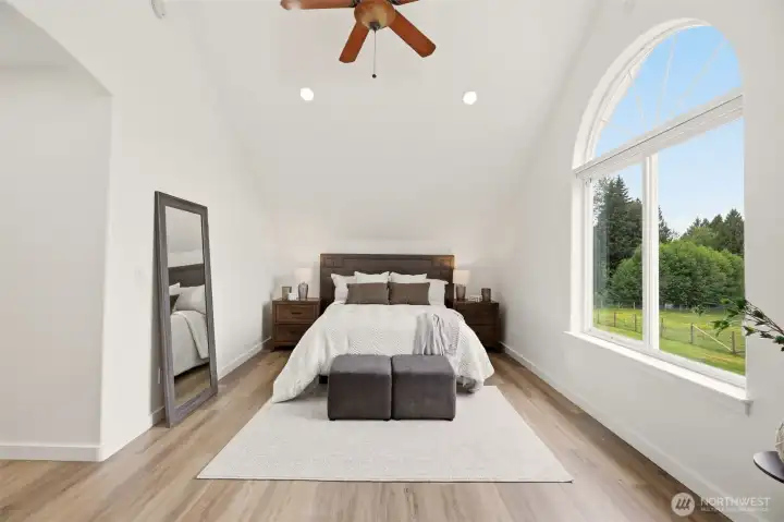 Large pictuesque window  with vaulted ceiling in the primary #2.
