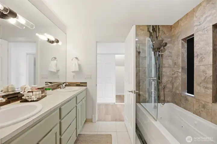 Full Ensuite bathroom with soaking tub in Primary #2.