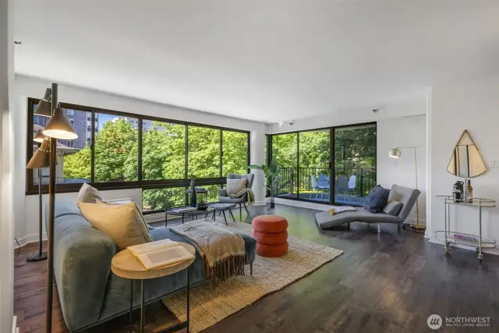 Spacious living room opening to balcony