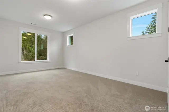 Main floor guest room or home office. Pics not of actual home, but similar floorplan and may contain upgrades.