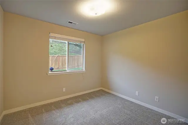 Bedroom1 is equipped with attractive 2" white blinds, new carpet and fresh paint.  Generous sized closets.  Perfect as bedroom or home office!