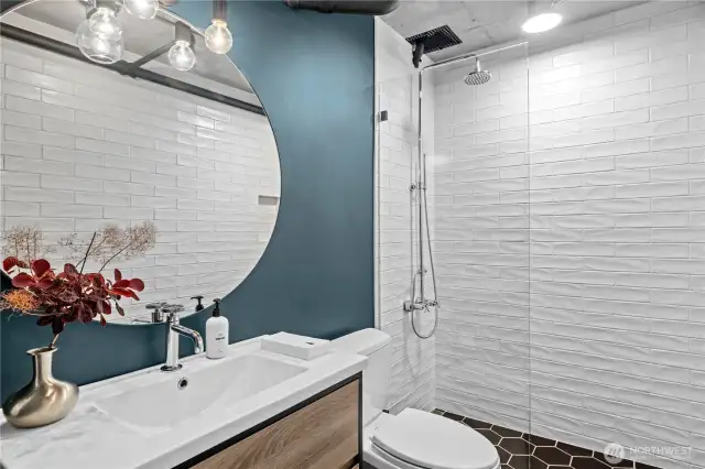Head-to-toe new guest bathroom with designer lighting and tile