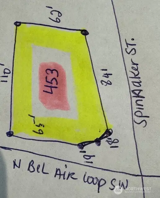 Corner lot N Bel Air Loop SW and Spinnaker St.