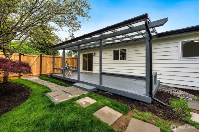 Side yard with patio and overhange
