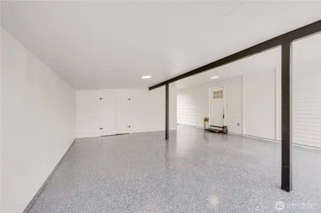 carport area with additional storage area
