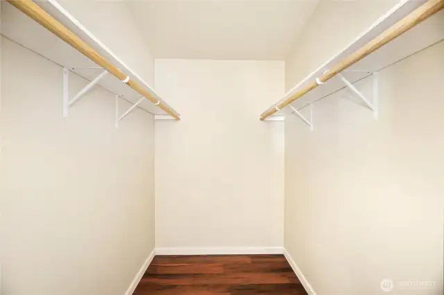 Walk in closet in primary bedroom