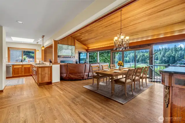 Living Room/Great Room  Spectacular floor to ceiling wood wrapped windows with argon gas, exterior sun shades. Custom corner window adds to the 180 degree serene water & sunset views.