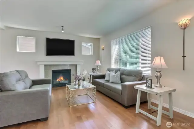 Step inside to a modern, freshly painted interior where the living room feels both inviting and incredibly comfortable. Natural light fills the space, highlighting the clean lines and warm tones. It’s the perfect spot to relax, entertain guests, or enjoy a quiet evening at home. This is comfort and style, thoughtfully combined.