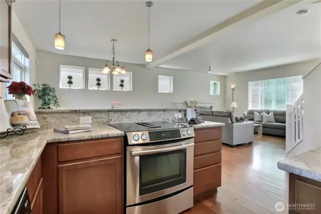 Preparing meals here keeps you connected to the conversation and laughter, thanks to the kitchen’s open layout. Whether guests are gathered in the dining room or relaxing nearby, you’re always part of the moment. It’s a space designed for togetherness, where cooking and connection go hand in hand. Every meal becomes a shared experience in this warm, inviting setting.