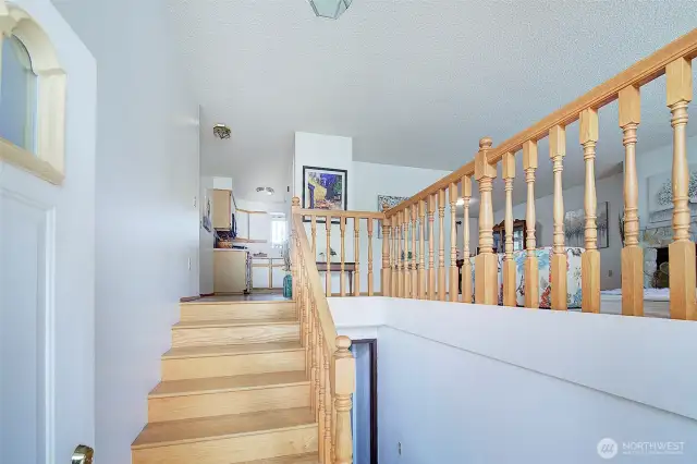 Lovely main entry with real wood trim and floors