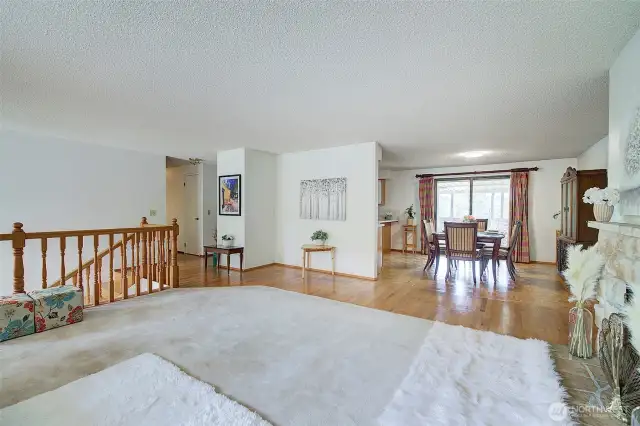 Living/dining rooms open out to another large covered deck, great for the summer BBQs and parties.