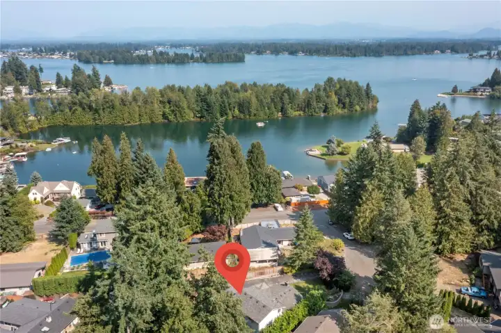 Steps from Lake Tapps with private community parks offering boat launch, swimming, beach athletic courts, playground and walking trails