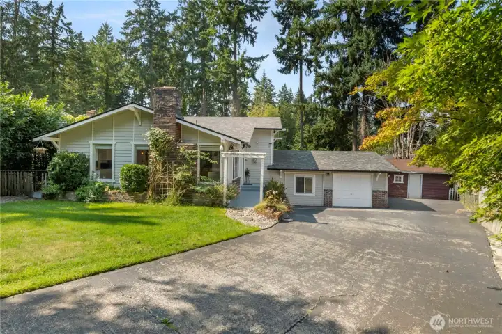 Plenty of room for parking on your long gated driveway.