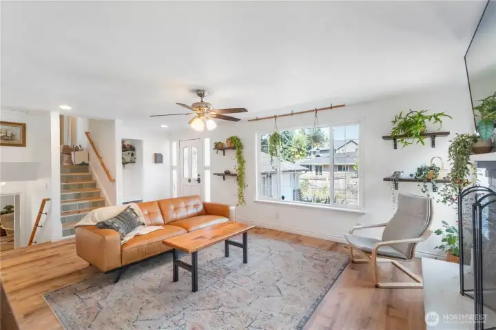 Tri level design offers easy access to bedrooms upstairs and big rec room + more space down
