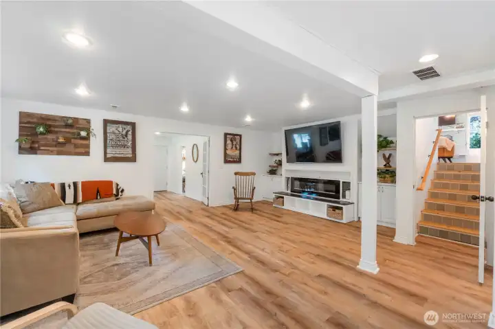 Spacious lower level with large rec room, luxury vinyl floor, 2 offices, 3/4 bath and laundry area
