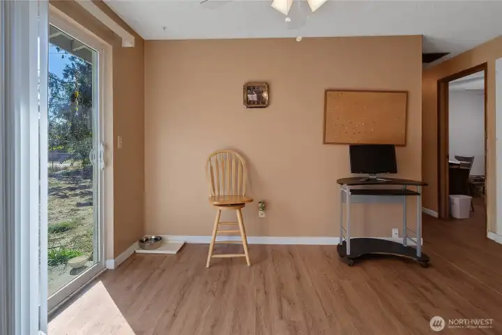 Kitchen nook for table & chairs, leads out to large fully fenced backyard!