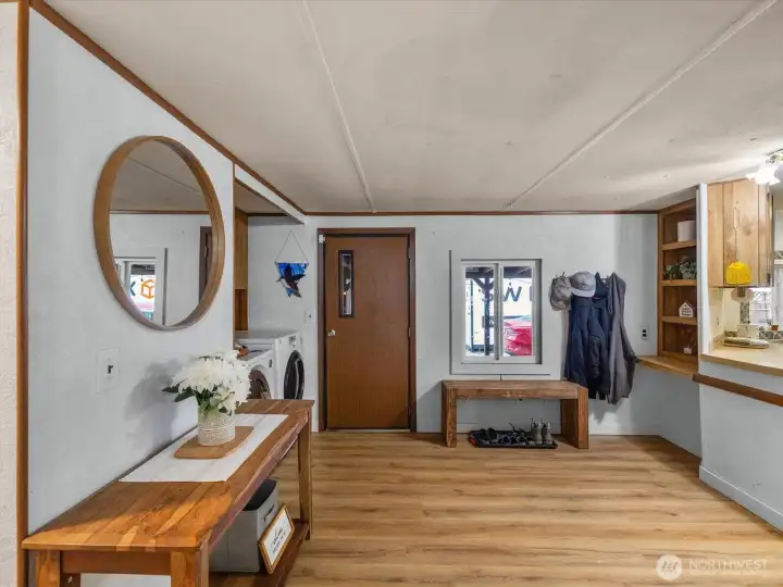 Extra large entry provides flexible living space, with room for additional dining space.