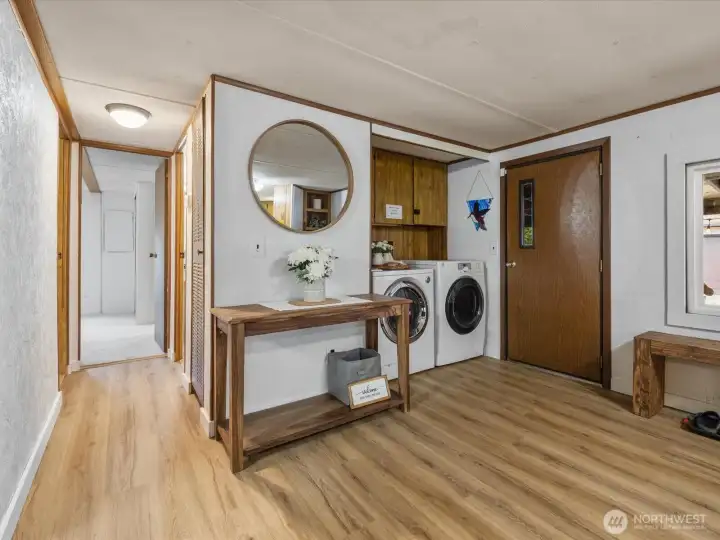 Open floor plan, with entry leading to three bedrooms.