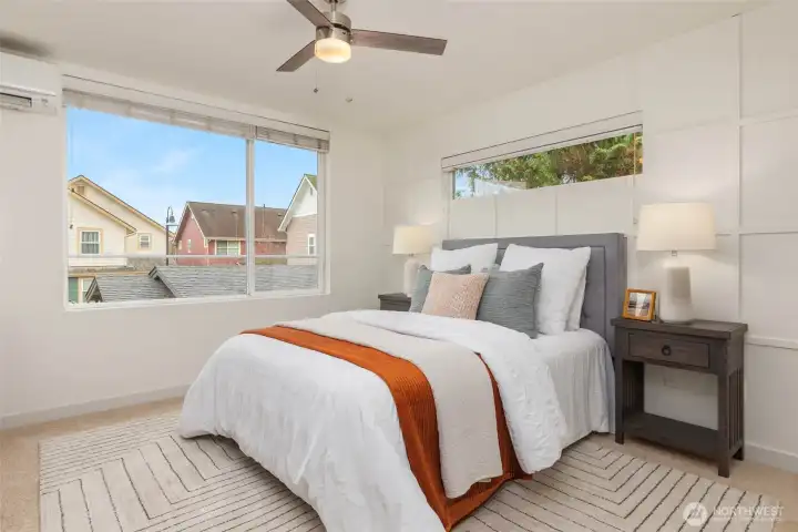 Spacious primary bedroom suite.