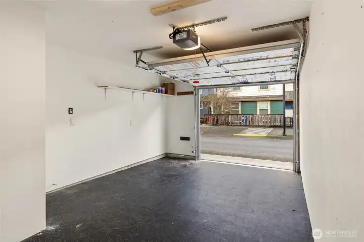 A view from inside the garage, with electric door opener.