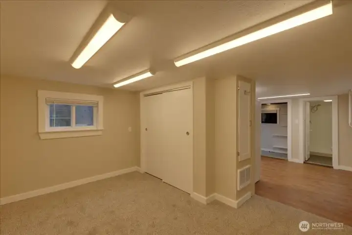 Unit #5 Bedroom to kitchen shot.