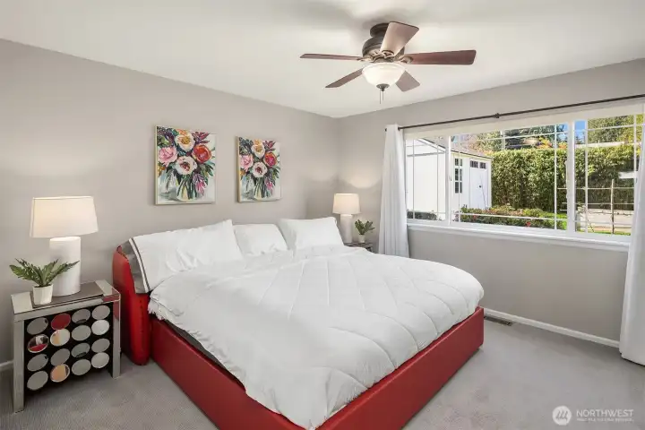 Spacious primary bedroom with large en-suite bathroom