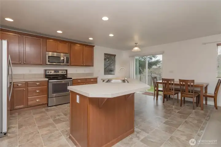 Fabulous kitchen space with additional informal eating space near slider to back yard