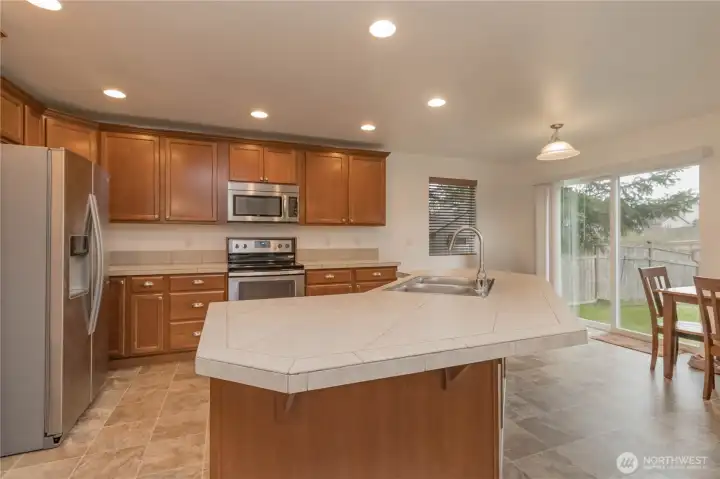 Another view of kitchen with fantastic island for additional seating with stools