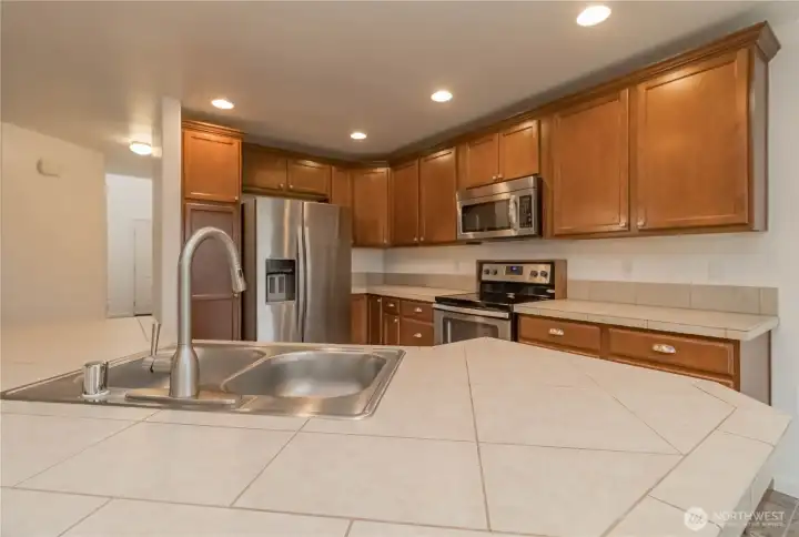 All kitchen stainless appliances stay included washer and dryer upstairs