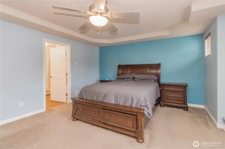 Primary en suite through door on left. Separate tub and shower, dual sinks and walk-in closet.